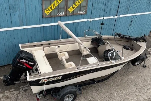 Slide: The Image of 2003 Monark King 190 boat with Mercury engine, parked at Sizzle Marine, Ohio. - 9