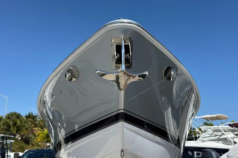 Slide: The Image of 2014 Formula 290 Sun Sport boat bow against clear blue sky. - 3