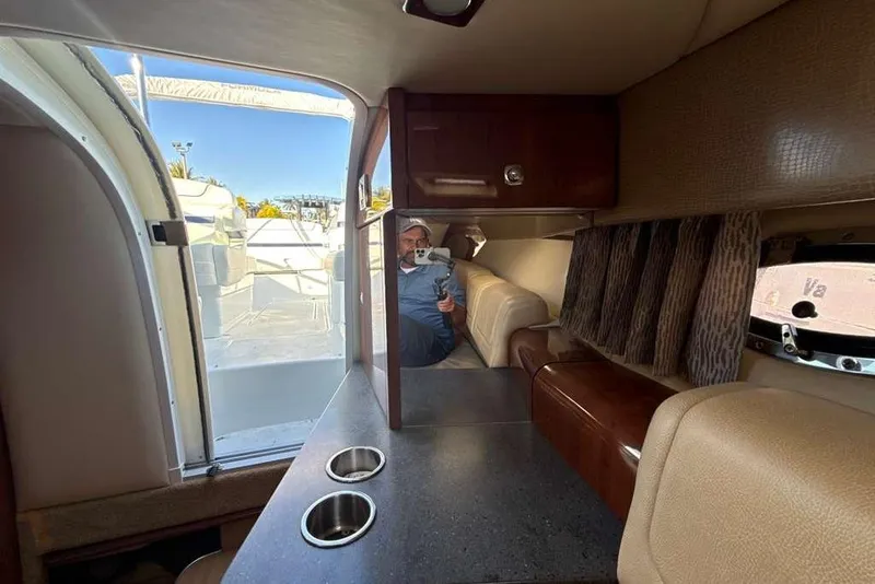 Slide: The Image of Interior of 2014 Formula 290 Sun Sport boat with seating and countertop. - 44