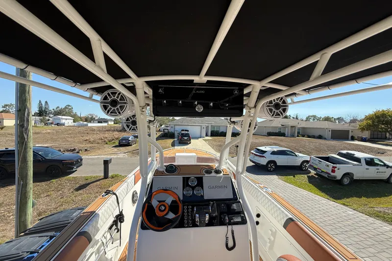 Slide: The Image of 2005 Renegade 29CC boat interior with Garmin navigation and audio system. - 15
