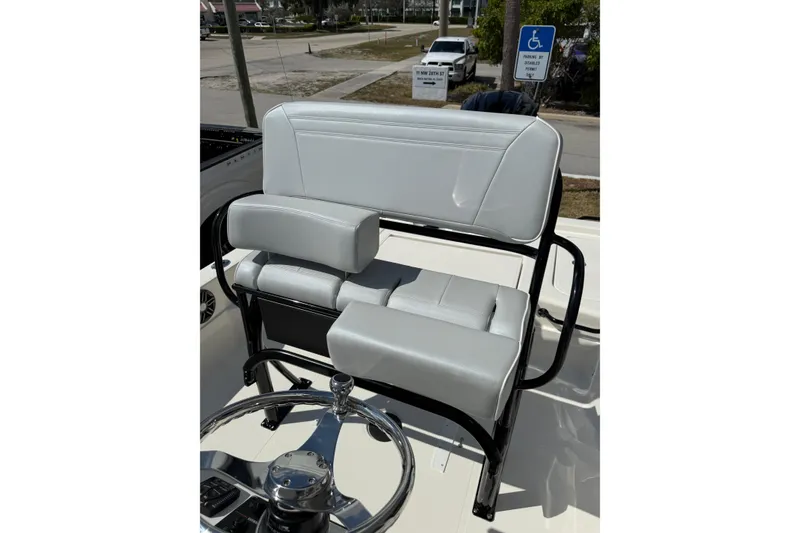 Slide: The Image of 2026 Skeeter SX221 boat seat with sleek design and comfortable cushioning. - 11