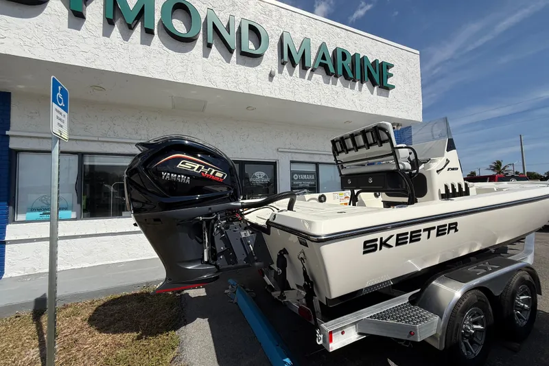 Slide: The Image of 2026 Skeeter SX221 boat with Yamaha engine at Dymond Marine dealership. - 15