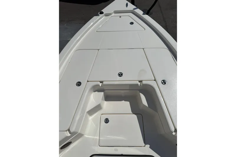 Slide: The Image of 2026 Skeeter SX221 boat deck with storage compartments and sleek design. - 6