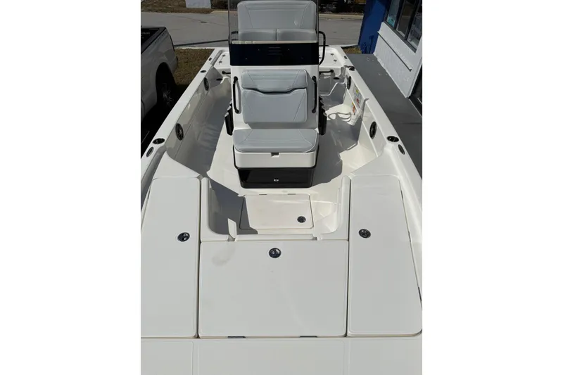 Slide: The Image of 2026 Skeeter SX221 boat interior with seating and storage compartments. - 8