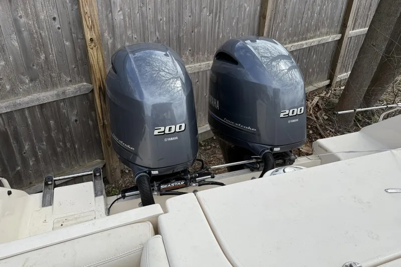 Slide: The Image of Twin Yamaha 200 outboard engines on a 2020 Grady-White Freedom 275 boat. - 8