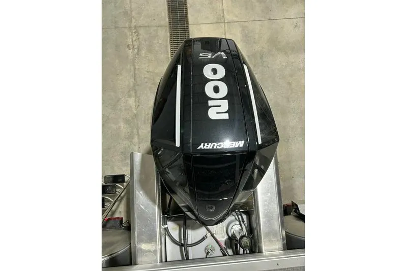 Slide: The Image of Mercury 200 outboard engine on 2026 Sun Tracker SportFish 22 XP3 boat. - 12