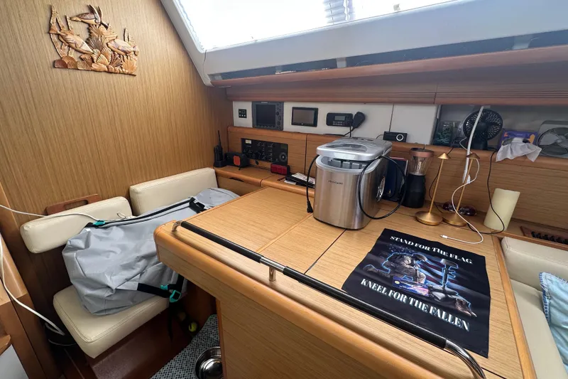 Slide: The Image of Interior of 2008 Jeanneau Sun Odyssey 45 DS yacht with navigation equipment and kitchen appliances. - 11