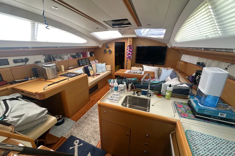 Slide: The Image of Interior of 2008 Jeanneau Sun Odyssey 45 DS yacht with modern amenities and cozy seating. - 20