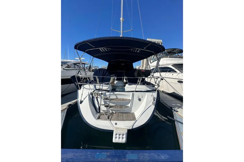 Slide: The Image of 2008 Jeanneau Sun Odyssey 45 DS sailboat docked at marina, rear view. - 28