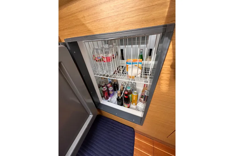 Slide: The Image of Refrigerator stocked with drinks inside 2008 Jeanneau Sun Odyssey 45 DS yacht. - 38