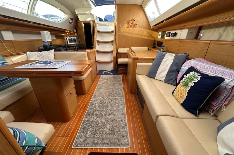 Slide: The Image of Luxurious interior of 2008 Jeanneau Sun Odyssey 45 DS sailboat with elegant wood finish. - 44