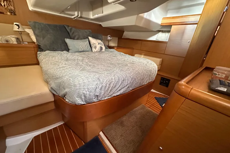 Slide: The Image of Luxurious cabin interior of 2008 Jeanneau Sun Odyssey 45 DS yacht with cozy bedding. - 50