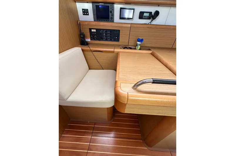 Slide: The Image of Interior of 2008 Jeanneau Sun Odyssey 45 DS yacht with navigation equipment and seating. - 54