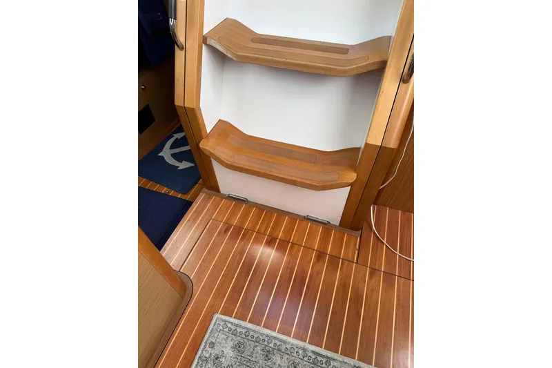 Slide: The Image of Interior view of 2008 Jeanneau Sun Odyssey 45 DS, featuring wooden steps and flooring. - 56