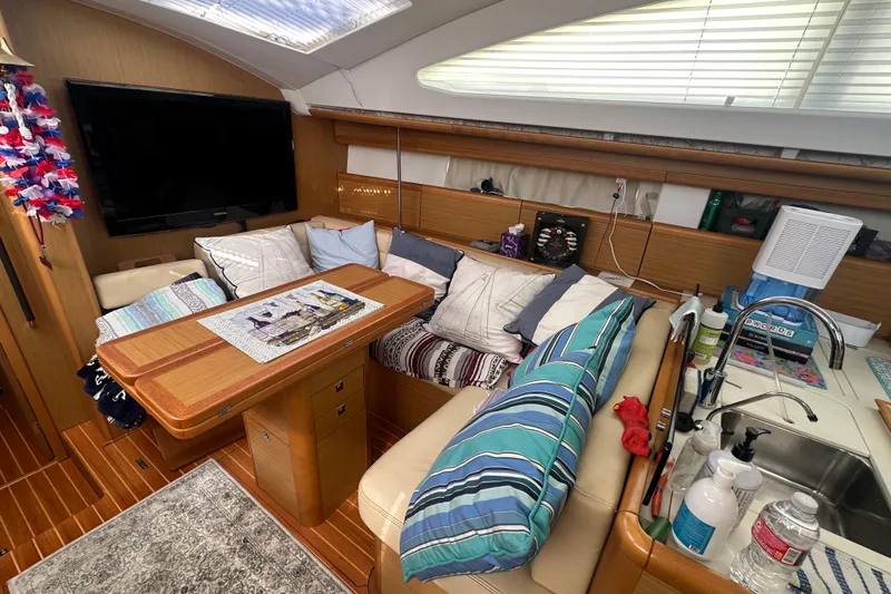 Slide: The Image of Interior of 2008 Jeanneau Sun Odyssey 45 DS sailboat with cozy seating and modern amenities. - 9