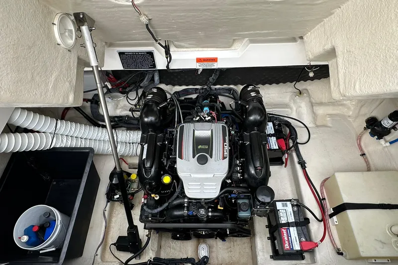 Slide: The Image of 2013 Rinker 276 Captiva Bowrider engine compartment with MerCruiser 350 MAG engine. - 36