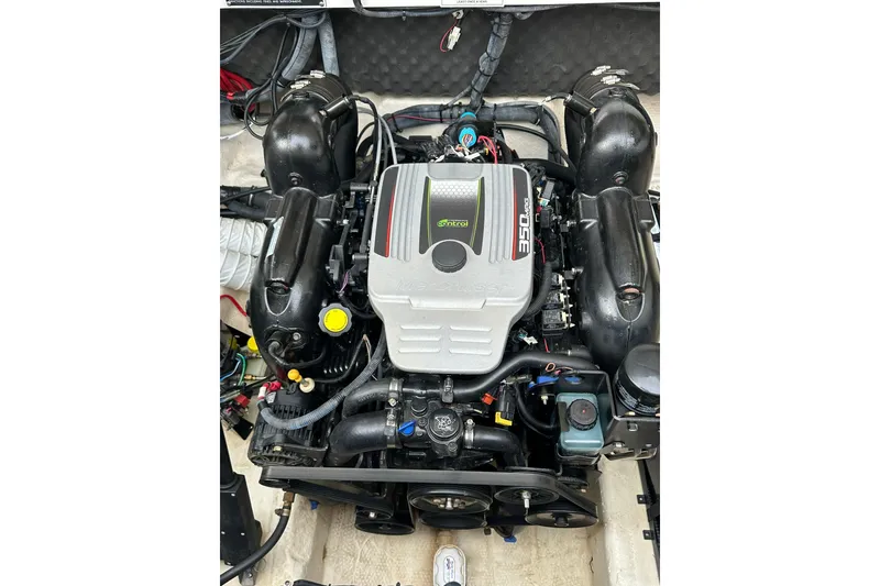 Slide: The Image of Engine of 2013 Rinker 276 Captiva Bowrider, featuring a 350 MAG motor. - 37