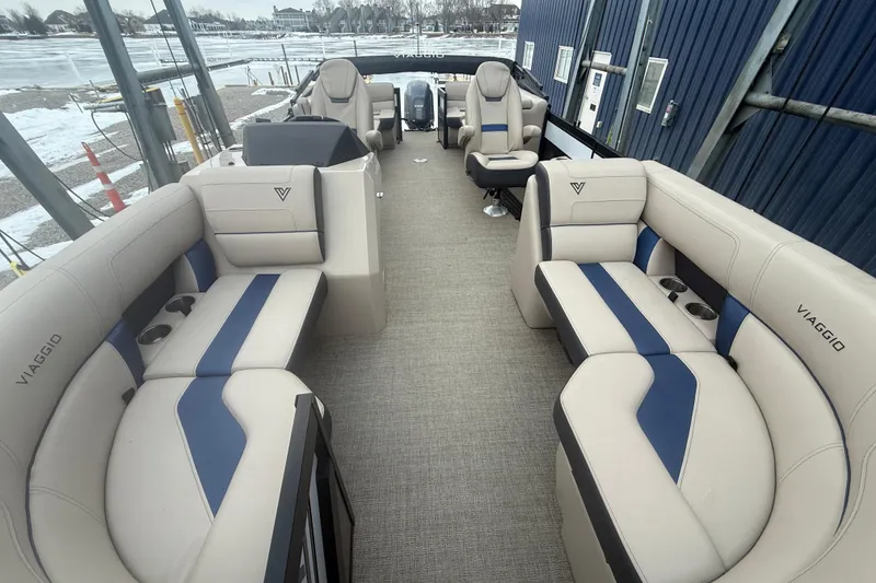 Slide: The Image of 2022 Viaggio Diamante 23U boat interior with luxurious seating and modern design. - 8