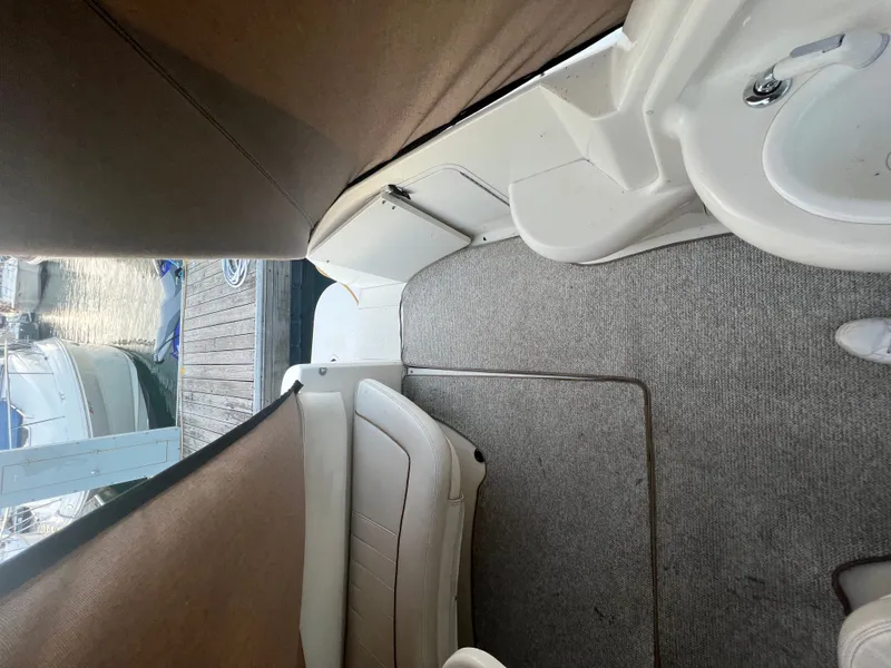 Slide: The Image of Interior of a 1999 Sea Ray Sundancer 310 yacht at the dock. - 23