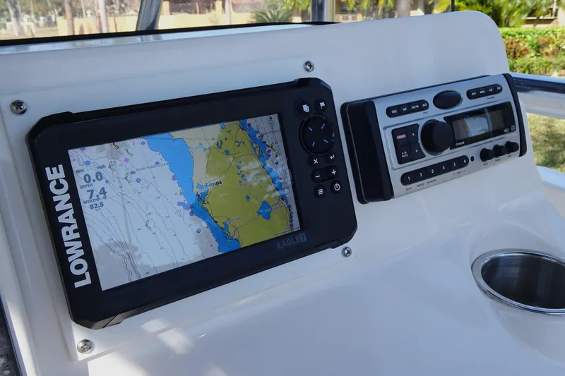 Slide: The Image of Console of 2007 Sea Hunt Triton 232 with Lowrance GPS and marine radio. - 15