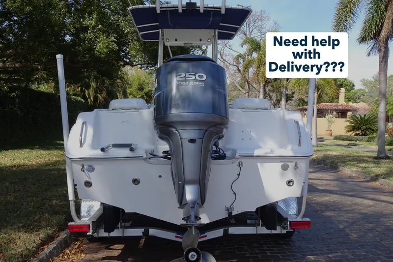 Slide: The Image of 2007 Sea Hunt Triton 232 boat with 250 horsepower engine, delivery assistance sign. - 5