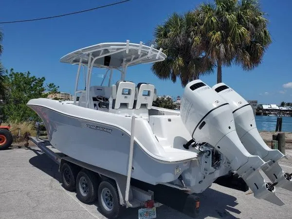 Slide: The Image of Aquasport 2500 Center Console 2022 - 2
