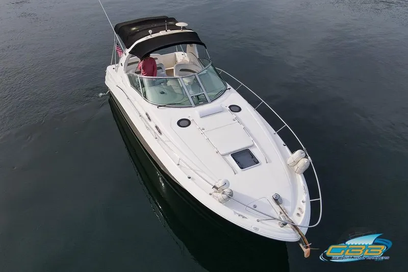Slide: The Image of 2007 Sea Ray Sundancer 320 cruising on calm waters, aerial view. - 10