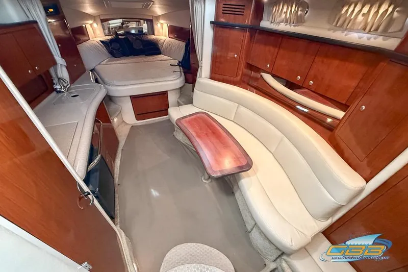 Slide: The Image of Luxurious interior of 2007 Sea Ray Sundancer 320 yacht with elegant seating and wood finishes. - 12