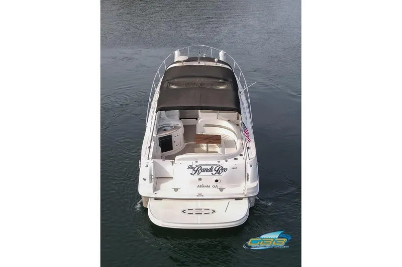 Slide: The Image of 2007 Sea Ray Sundancer 320 yacht on calm water, rear view. - 6