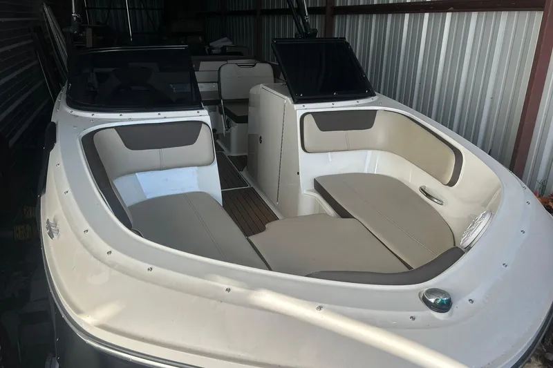 Slide: The Image of 2017 Bayliner VR6 Bowrider I/O with spacious seating in a storage unit. - 2