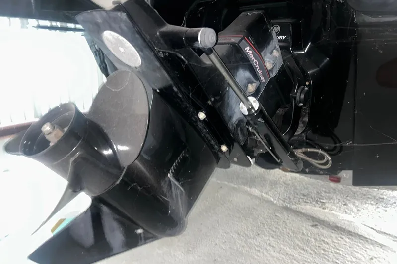 Slide: The Image of 2017 Bayliner VR6 Bowrider I/O boat engine and propeller close-up. - 24