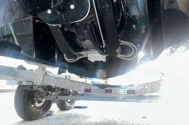 Slide: The Image of Underneath view of a 2017 Bayliner VR6 Bowrider I/O on a trailer. - 27