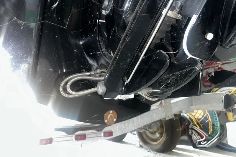 Slide: The Image of 2017 Bayliner VR6 Bowrider I/O boat engine detail on trailer. - 30