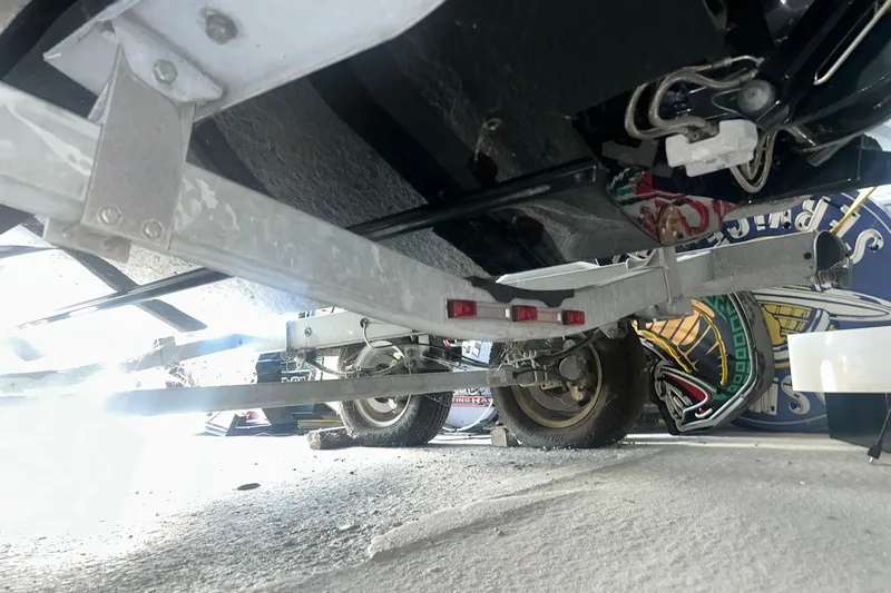 Slide: The Image of Underneath view of a 2017 Bayliner VR6 Bowrider I/O on a trailer. - 35