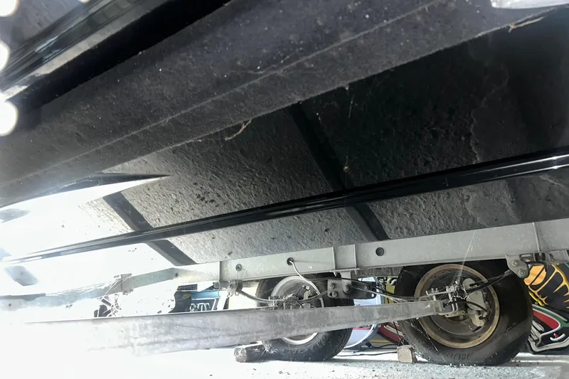Slide: The Image of Underside view of a 2017 Bayliner VR6 Bowrider I/O on a trailer. - 36