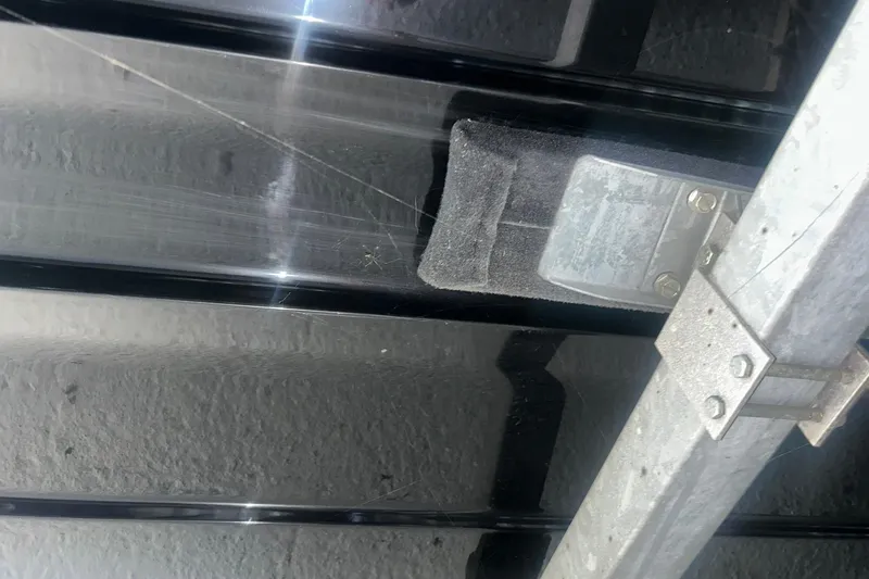 Slide: The Image of Close-up of 2017 Bayliner VR6 Bowrider I/O hull and trailer connection. - 38