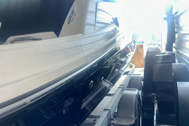 Slide: The Image of 2017 Bayliner VR6 Bowrider I/O on trailer, side view in storage. - 42
