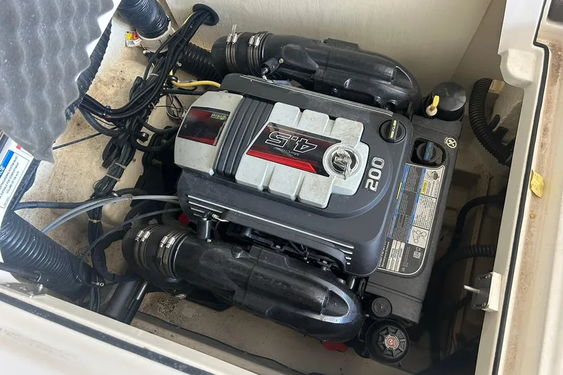 Slide: The Image of 2017 Bayliner VR6 Bowrider I/O engine compartment with 4.5L 200 HP motor. - 48