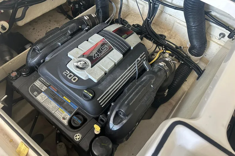 Slide: The Image of Engine compartment of a 2017 Bayliner VR6 Bowrider I/O with Mercury 4.5L 200 HP engine. - 49