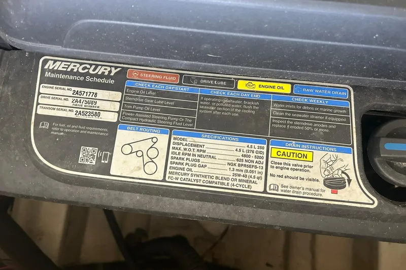 Slide: The Image of Mercury maintenance schedule label on 2017 Bayliner VR6 Bowrider I/O engine compartment. - 50