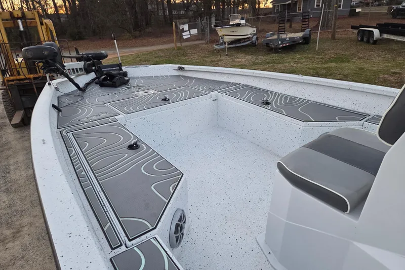 Slide: The Image of 2023 Xpress H22B Bay boat with spacious deck and modern design. - 16