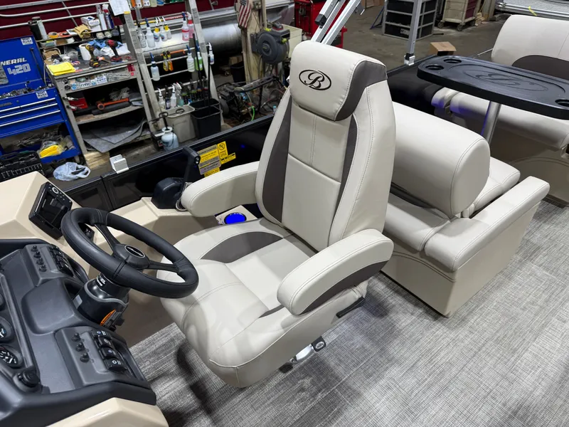 Slide: The Image of Interior of 2026 Bentley Pontoons Legacy with luxurious seating design. - 12