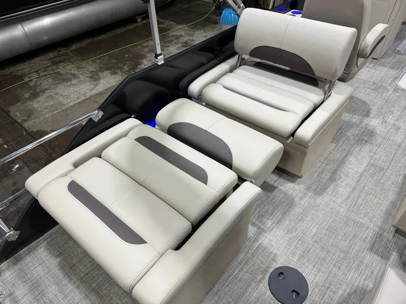 Slide: The Image of Interior of 2026 Bentley Pontoons Legacy with luxurious seating. - 21