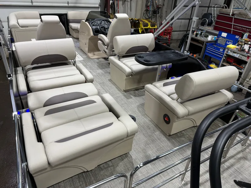 Slide: The Image of Interior of 2026 Bentley Pontoons Legacy with luxurious seating. - 22