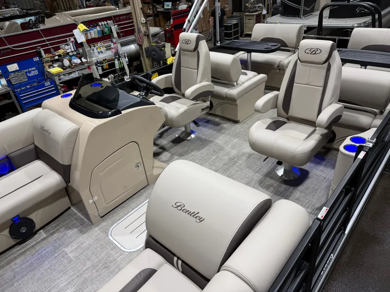 Slide: The Image of Interior of 2026 Bentley Pontoons Legacy with luxurious seating. - 3