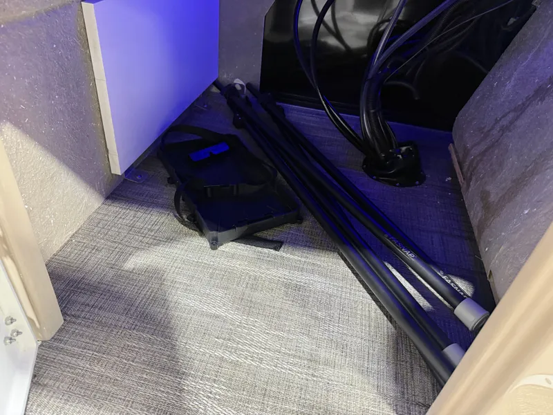 Slide: The Image of Interior of 2026 Bentley Pontoons Legacy with rods and cables. - 32