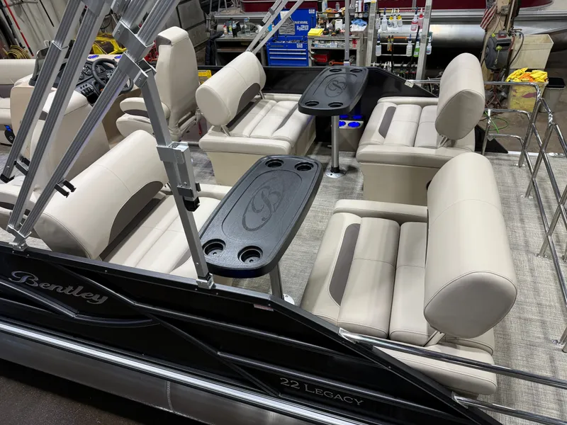 Slide: The Image of Interior of 2026 Bentley Pontoons Legacy with luxurious seating. - 4
