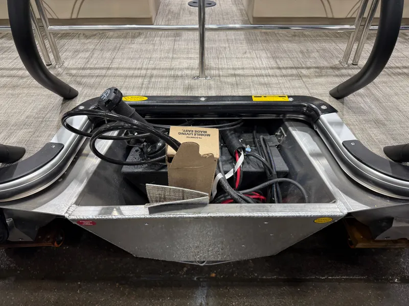 Slide: The Image of Interior view of 2026 Bentley Pontoons Legacy with cables and box. - 41