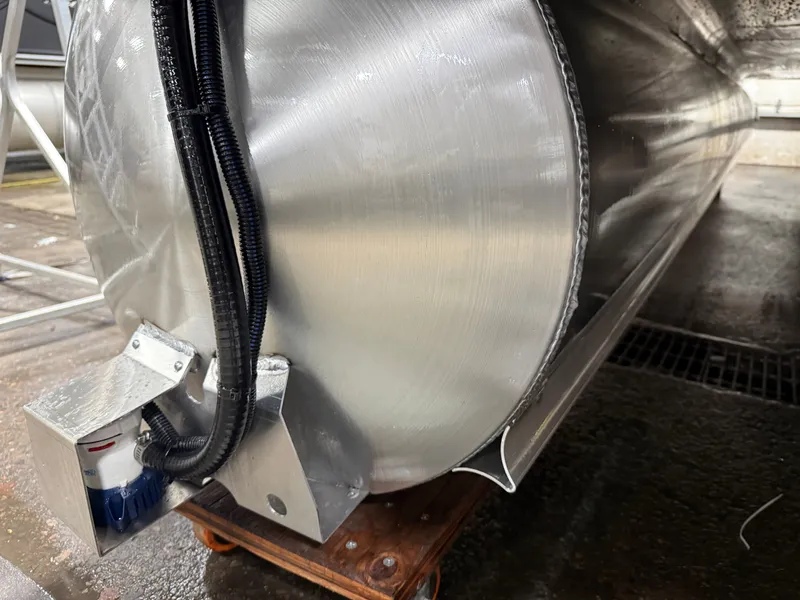 Slide: The Image of Close-up of a 2026 Bentley Pontoons Legacy Tritoon. - 44