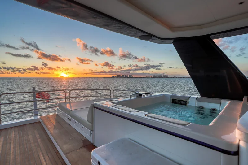 Slide: The Image of Luxury Sirena 88 yacht with jacuzzi at sunset, 2021 model, ocean view. - 13